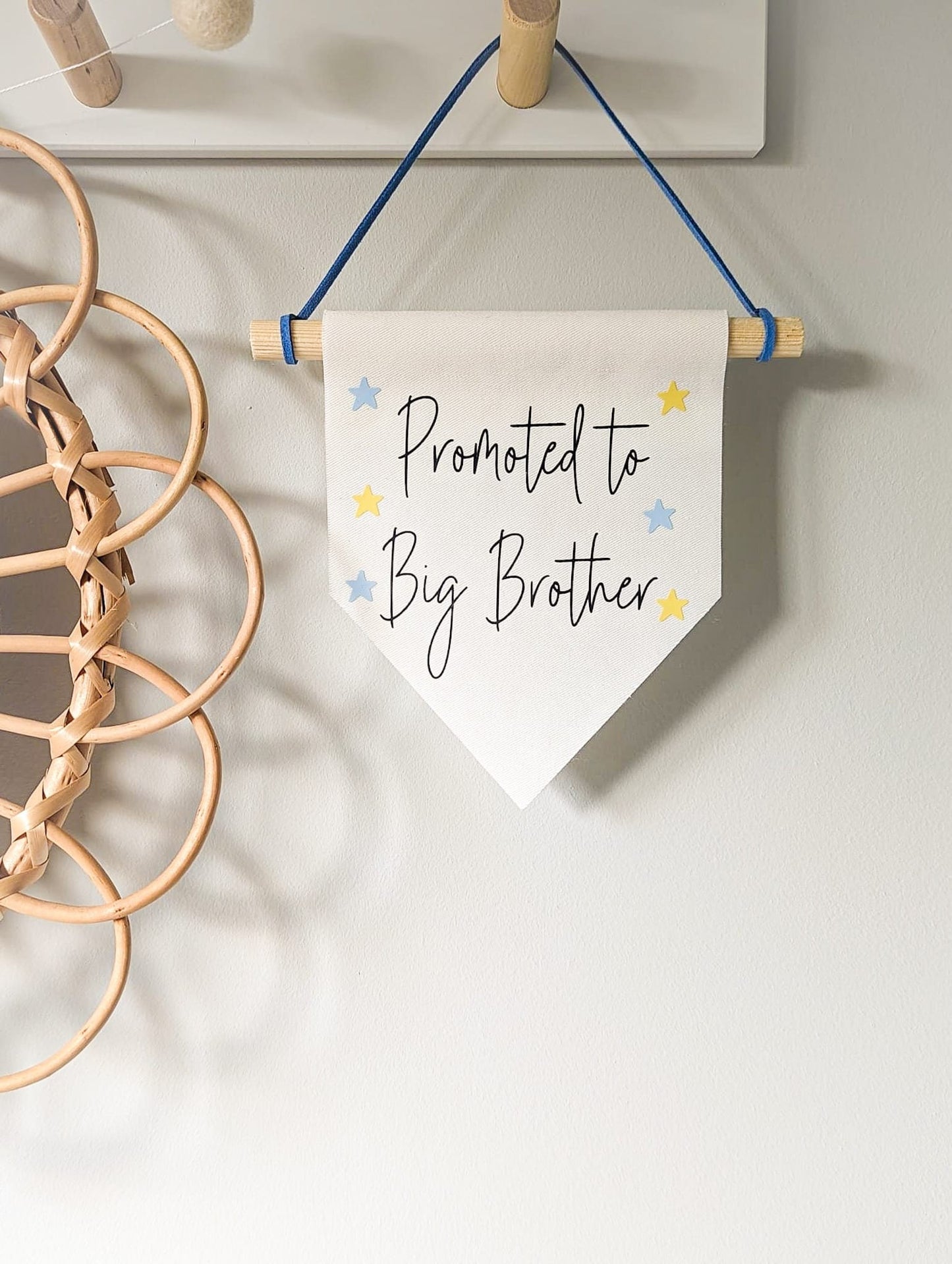 'Promoted to Big Brother' wall banner
