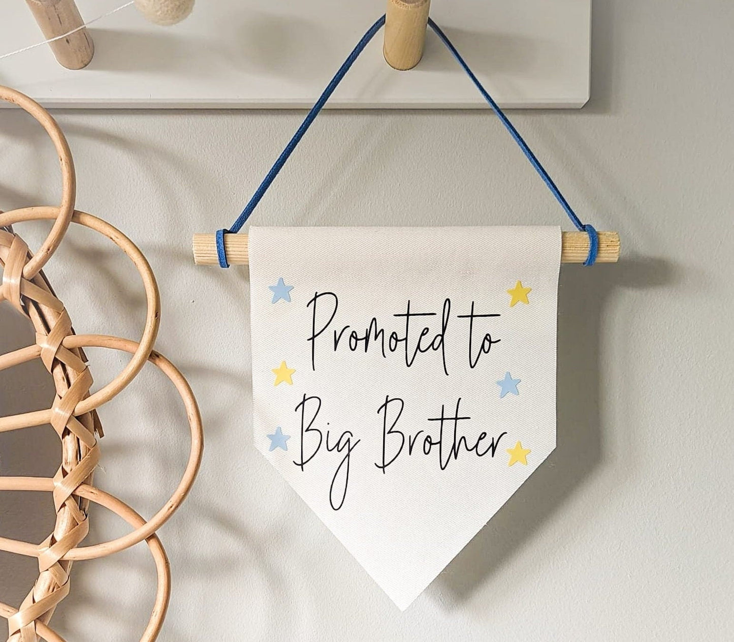 'Promoted to Big Brother' wall banner