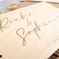 “Personalised wooden wedding guest book engraved with surname and date”

“Engraved basswood guest book with spiral binding”

“Rustic wooden wedding guest book on woven mat”