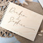“Personalised wooden wedding guest book engraved with surname and date”

“Engraved basswood guest book with spiral binding”

“Rustic wooden wedding guest book on woven mat”