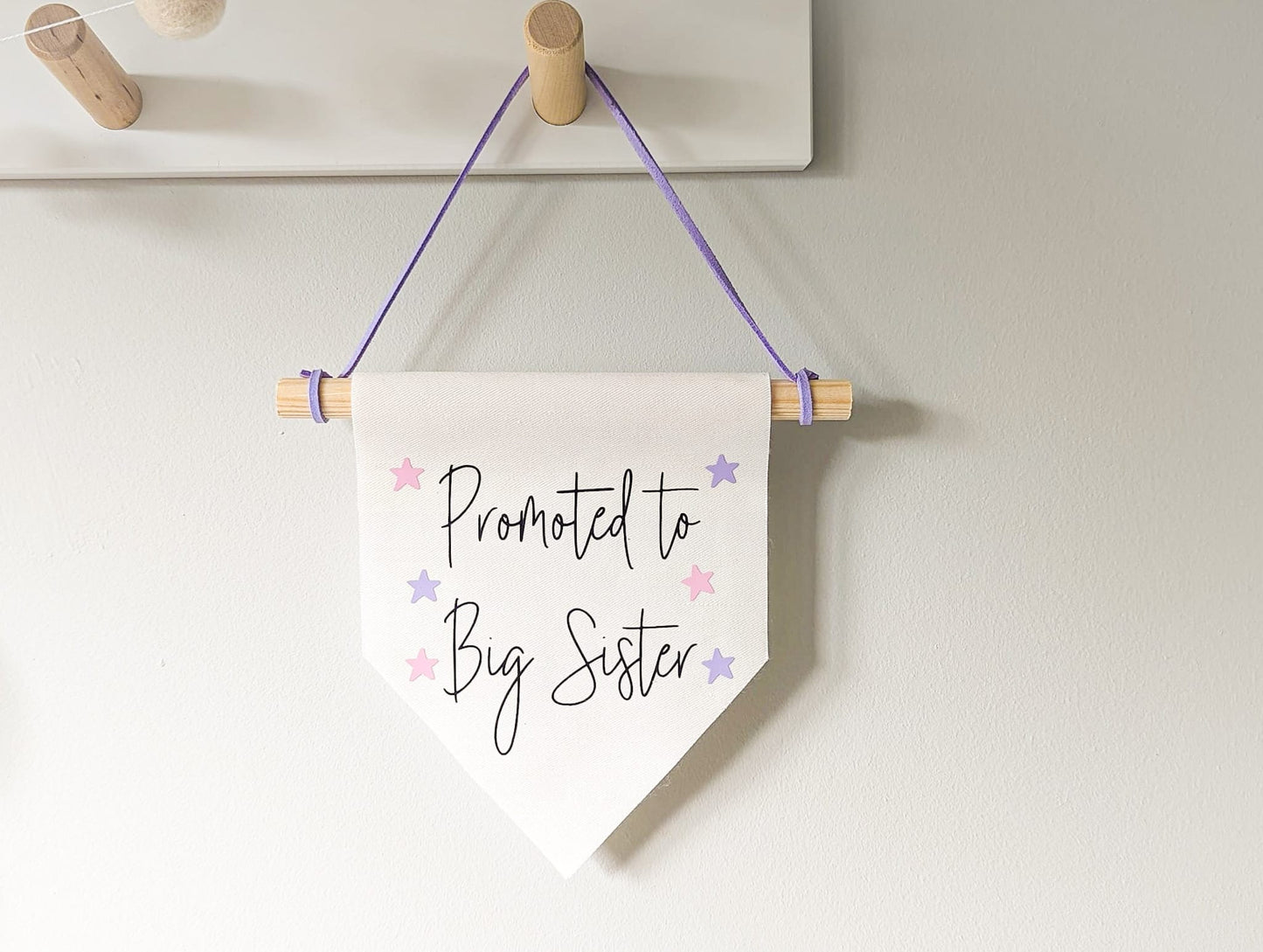 'Promoted to Big Sister' wall banner