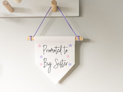 'Promoted to Big Sister' wall banner