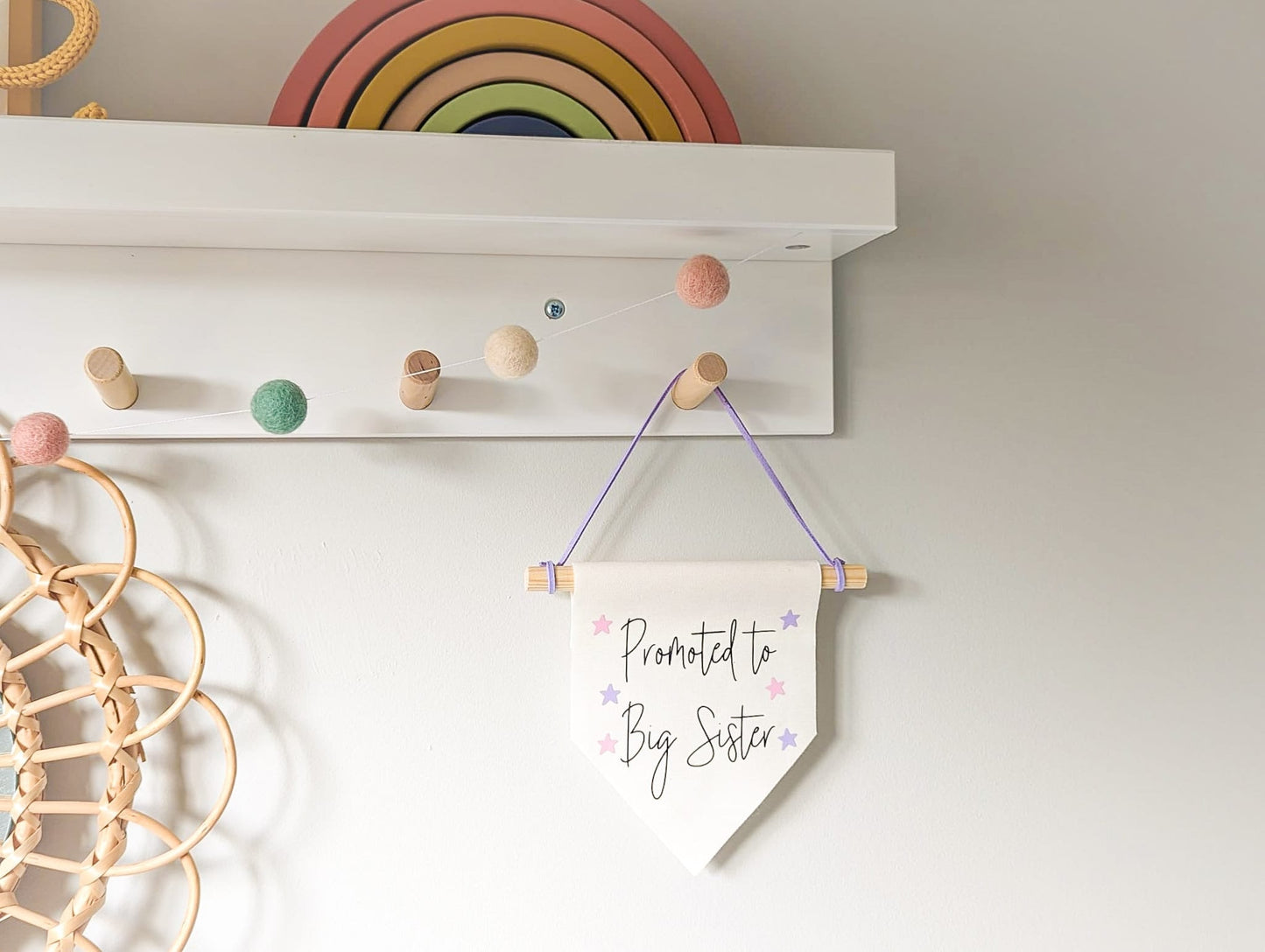 'Promoted to Big Sister' wall banner
