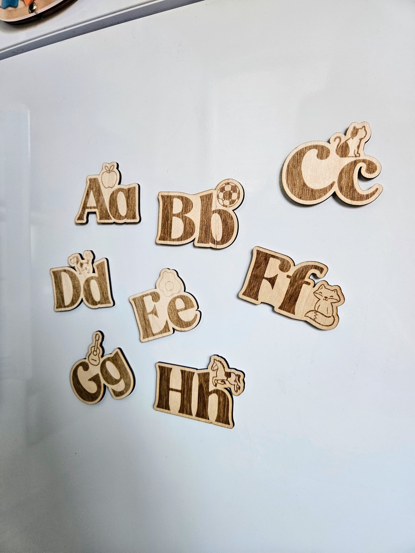 Wooden alphabet fridge magnets