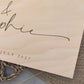 “Personalised wooden wedding guest book engraved with surname and date”

“Engraved basswood guest book with spiral binding”

“Rustic wooden wedding guest book on woven mat”